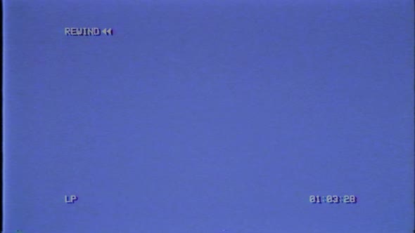 VCR Rewind symbol on blue screen. alt