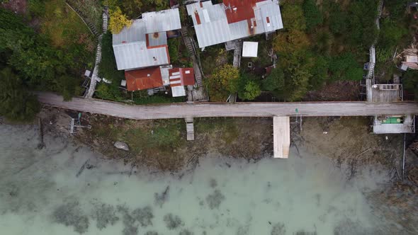 Drone footage of a walkcat in Caleta Tortel, a village without streets in South America. Patagonia,