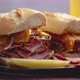 Delicious Pastrami Meat Sandwiches Served with Glass of Beer Pickles Potato Chips and Sides - VideoHive Item for Sale