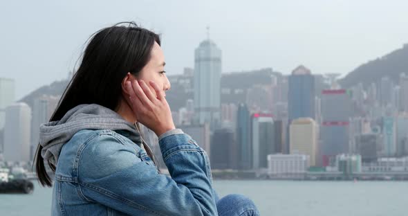 Woman enjoy music in the city of Hong Kong