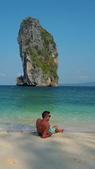 European Men on Tropical Beach in Thailand White Tropical Beach of Koh Poda Thailand