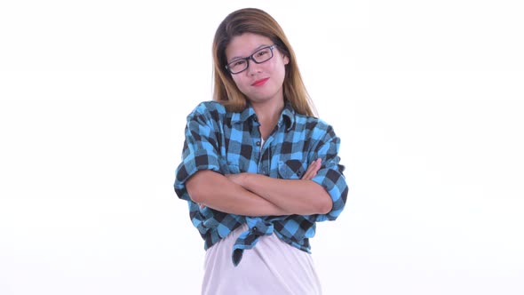 Happy Young Asian Hipster Woman Smiling with Arms Crossed