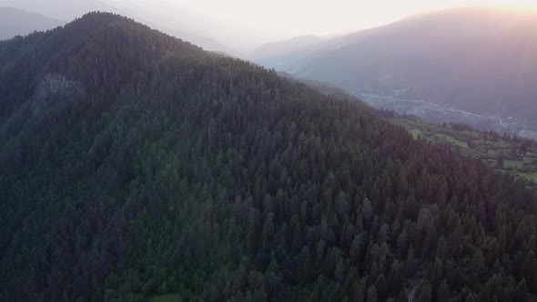 Sunset under the mountain aerial