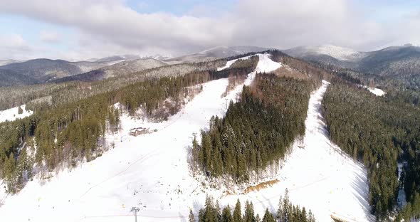 Aerial View of the Ski Resort in Mountains at Winter