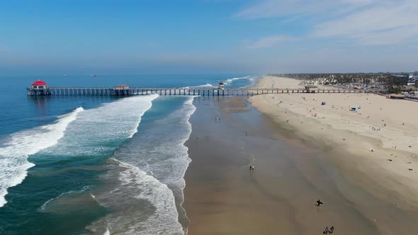 Aerial View of Huntington Pier, Beach and Coastline During Sunny Summer Day