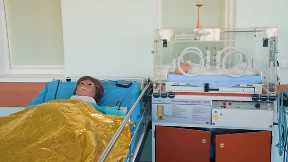 Medical education training and workshop. Close up of plastic dummy on hospital bed