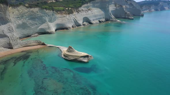 Sheer White Cliffs Of Cape Drastis Near Peroulades 9