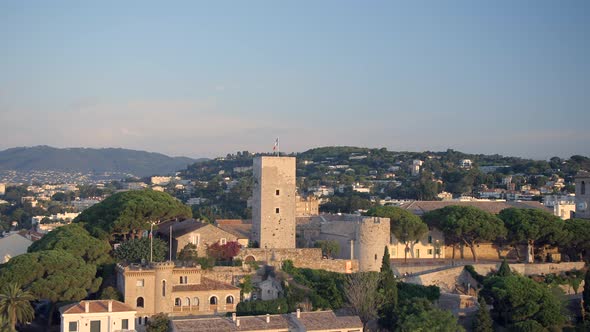 Clock Tower and City of Cannes at Sunrise