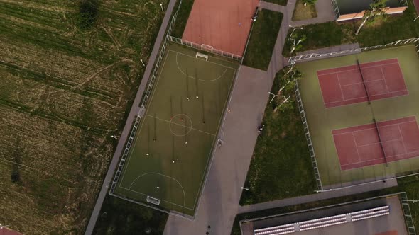 Shooting From a Copter of Outdoor Sports Fields in the Green Recreation Area. The Camera Slowly