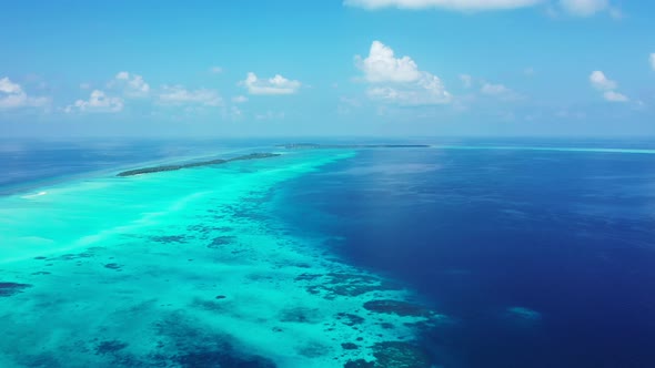 Natural overhead tourism shot of a summer white paradise sand beach and blue ocean background 