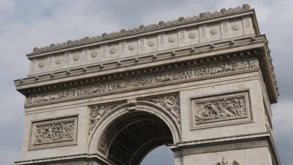Symbol of France and Paris Arc de Triomphe  by the day  4K 2160p 30fps UltraHD tilt footage - French