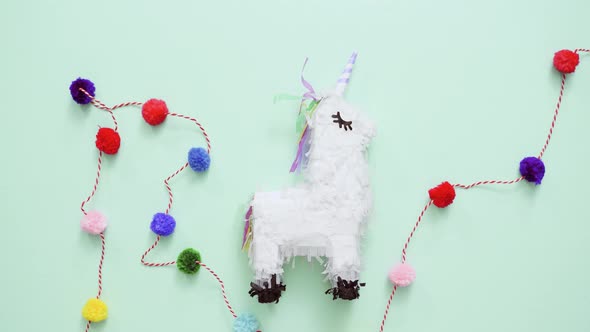 Small unicorn pinata for kids birthday party.