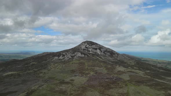 Angle toward mountain while elevating position