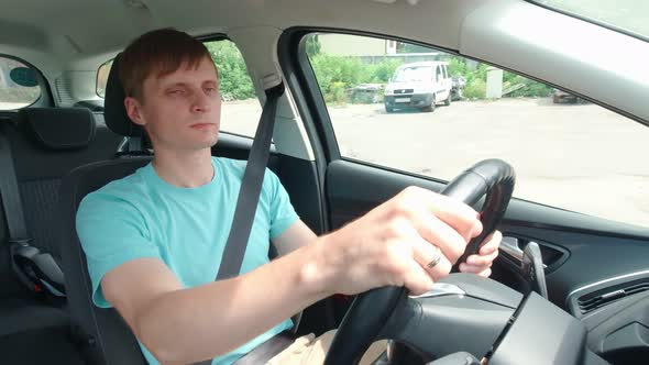 Man Driving A Bad Road