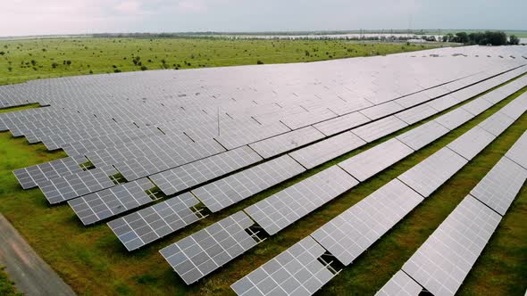 Drone fly over Solar Farm. Renewable green energy. Alternative energy sources.