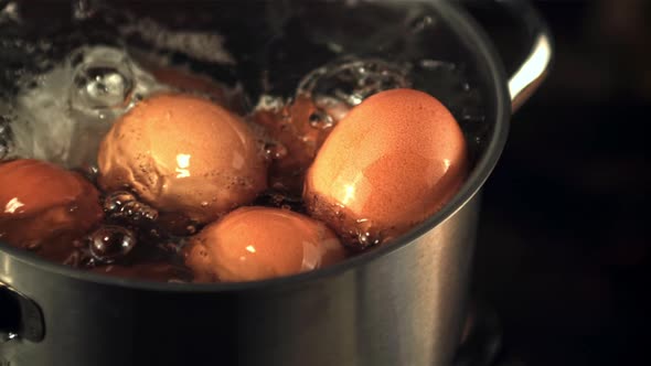 Super Slow Motion in the Pan is Cooked Fresh Eggs for Breakfast