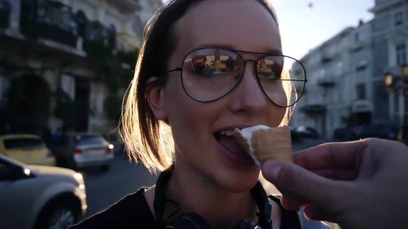 Male Hand with a Waffle Cone Icecream Feeding His Girlfriend Make a Joke Poked Ice Cream in the Nose