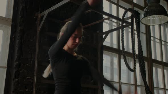 Young Girl Doing Sports in the Gym