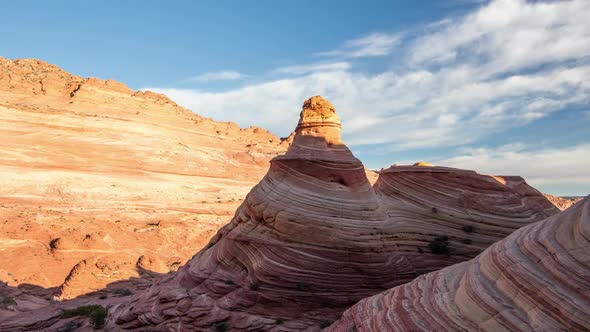 Panning Time Lapse as Red Rock Lights up and Clouds Move Across the Sky