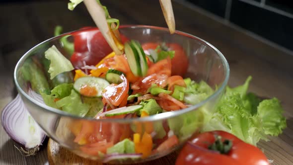 Cooking Delicious Tomato Pepper Salad in Kitchen at Home