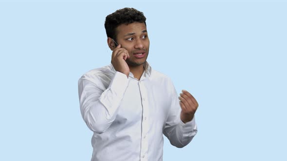 Businessman Explaining Something on the Futuristic Phone.