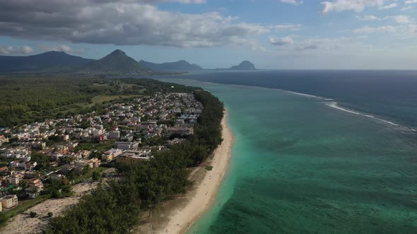 Bird's Eye View of a Suburb with a Beautiful White Beach on the Island of Mauritius