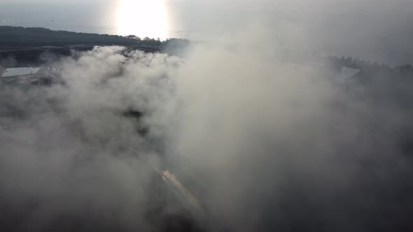 Aerial view burning happen at landfill site
