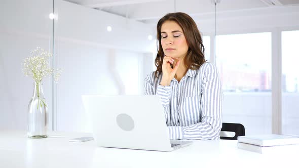 Sleeping Hispanic Woman in Office, Tired of Work Load