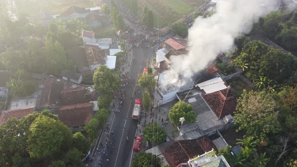 Aerial view of house fires in densely populated settlements in Indonesia