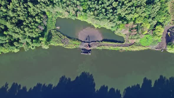 Cleaning and Deepening By a Dredger on the River Aerial View