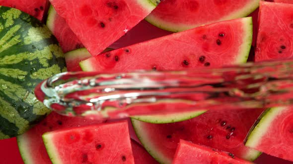 Super Slow Motion Shot of Splashing Water on Fresh Watermelon Slices at 1000Fps