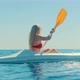 Paddling Canoe Adventure. Tourist Woman Spending Day Kayaking On Sea. Active Woman Having Fun. - VideoHive Item for Sale