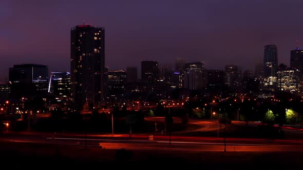 Denver Skyline Dramatic Sunrise in Fog Timelapse Pan Right