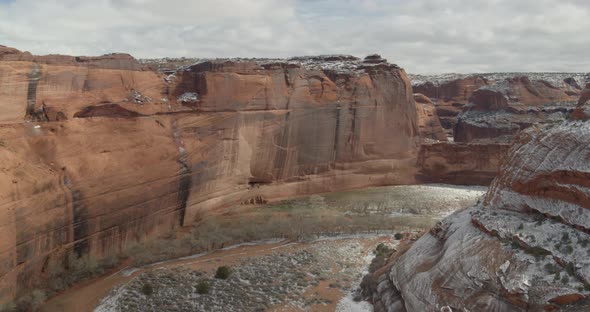 A flight through a snow covered canyon