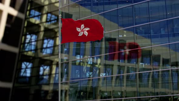 Hong Kong Flag Waving On A Skyscraper Building