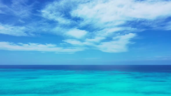 Aerial abstract of luxury coast beach time by aqua blue water with white sandy background of a daytr