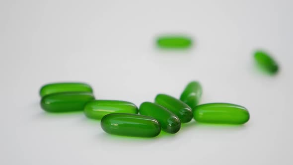 Close view of green tablets on white table