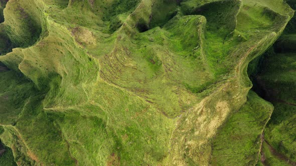 Cinematic  Aerial Green Mountains Ridge of World-famous Na Pali Hawaii Island