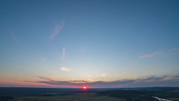 Timelapse Hyperlapse Summer Morning in the Valley Bright Sun Rises Over Wonderful Woodland