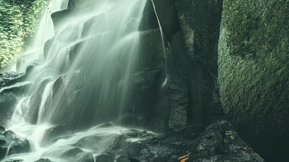 Beautiful Kanto Lampo Waterfall on Bali Island Indonesia - Travel and Nature Background. Timelapse 