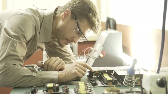 Electronics engineer at work