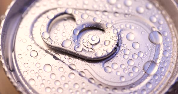 Water droplets on aluminum can of soda or beer