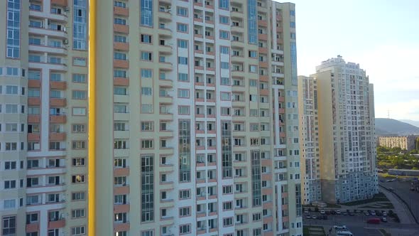 Each of these windows has their stories,From behind each one, somebody looks at the river.