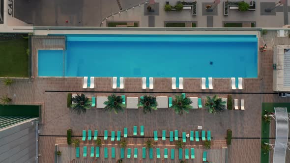 Top view of an empty hotel swimming pool 