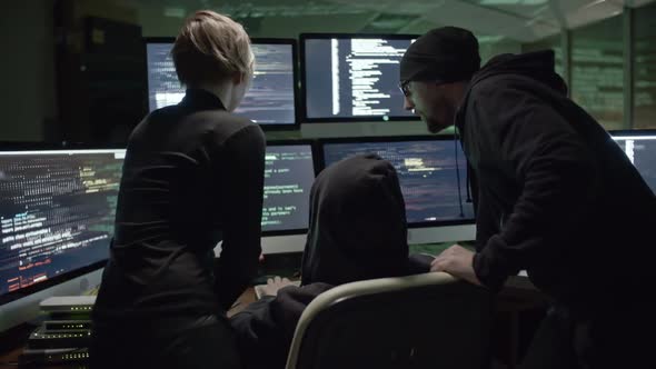 Programmers Writing Codes at Night