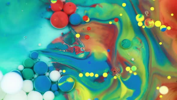 Abstract Multicolored Bubbles Paint. Slow Motion. Top View