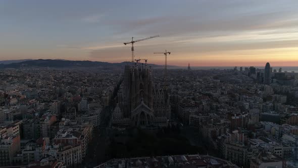 Cathedral of Sagrada familia on Barcelona surrounded by other Buildings