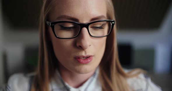 Stressed Executive Talking On Cellphone In Office