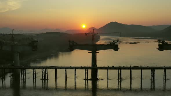 Aerial View Of Construction High-Speed Train Crossing Mekong River