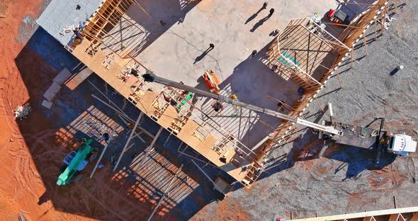 Crane Holds Timber Roof Frame of Wooden Rafters Beams an Interior View House Building